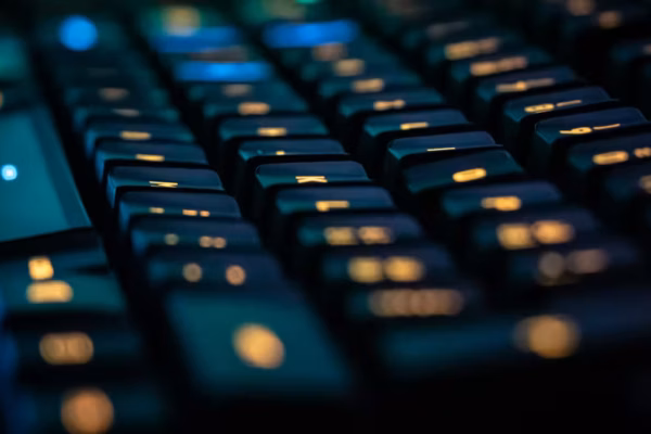 a keyboard with orange lighting