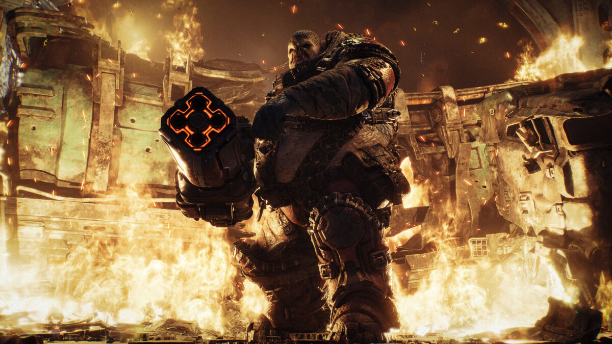 A Gear walks through a burning street in Gears of War: E-Day