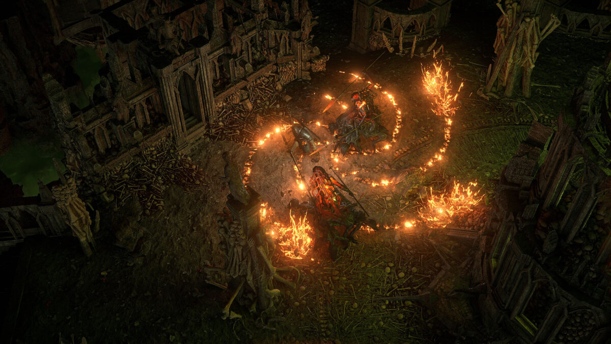 Path of Exile 2 screenshot of a character casting a spiral of fire across a courtyard of bones and gothic ruins