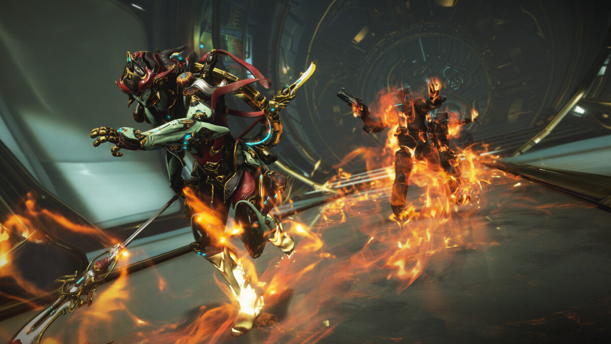 Warframe squad charging down a corridor wreathed in fire