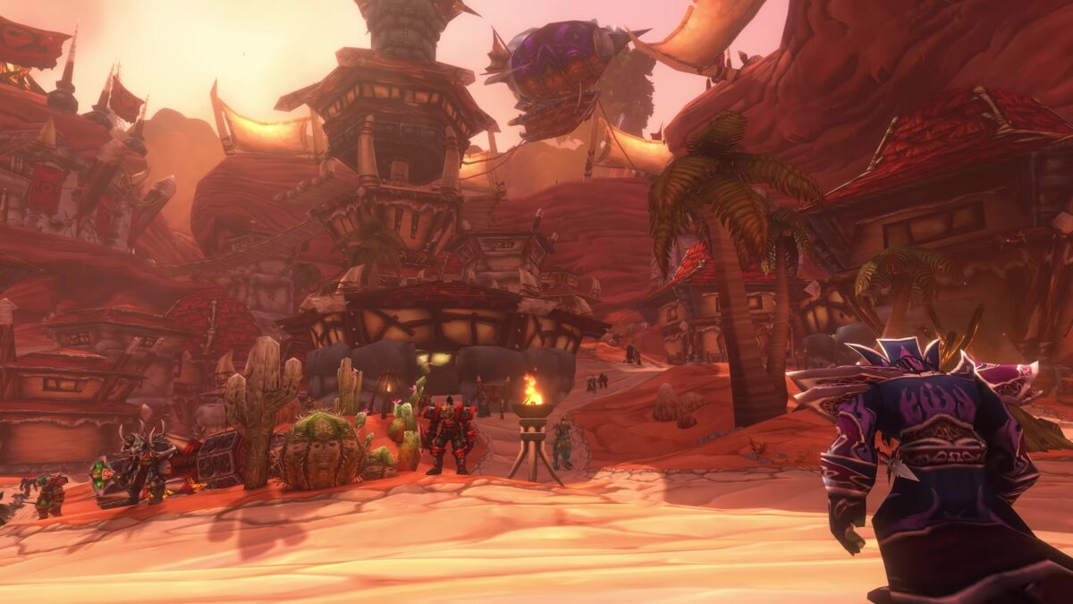 World of Warcraft: Forever trailer frame of Horde players gathered outside the Orgrimmar gates at sunset